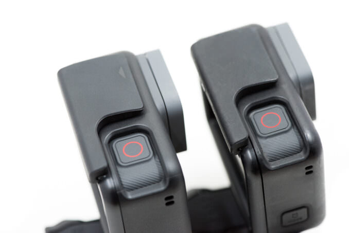 Shutter buttons of a GoPro HERO6 Black and HERO5 Black side by side.