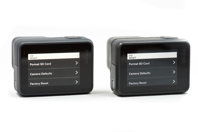 Back screens of a GoPro HERO6 Black side-by-side with a HERO5 Black.