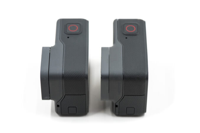 The tops of a GoPro HERO6 Black side-by-side with a HERO5 Black, seen from above.