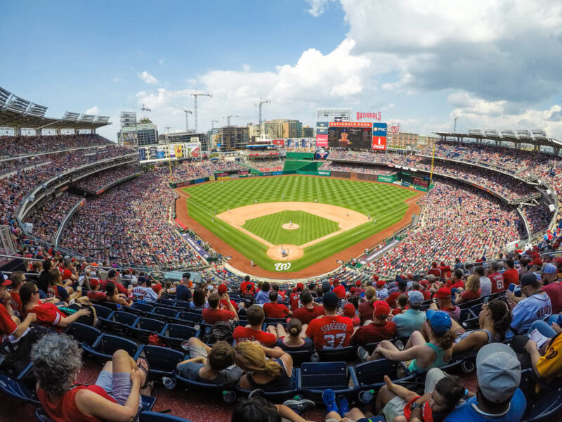 Panoramic view of Nationals Park baseball stadium packed with fans during a day game