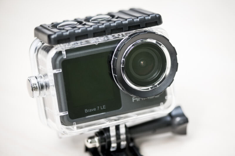 AKASO Brave 7 LE action camera sealed in its clear waterproof housing with mount