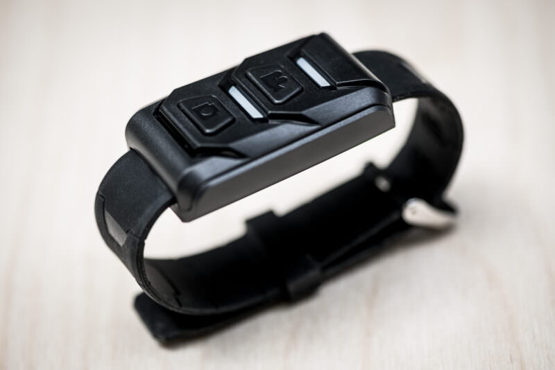 Wrist-worn remote control for the AKASO Brave 7 LE with two buttons