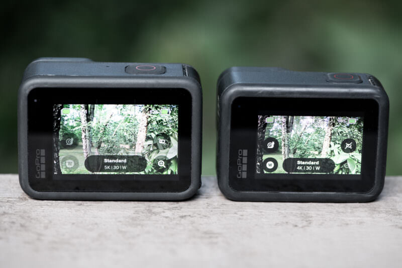 GoPro HERO9 Black and HERO8 Black touchscreens in camera view mode framing a wooded scene at 5K and 4K