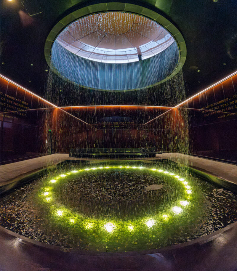 Circular skylight pouring water into the reflecting pool at the Martin Luther King Jr. Memorial