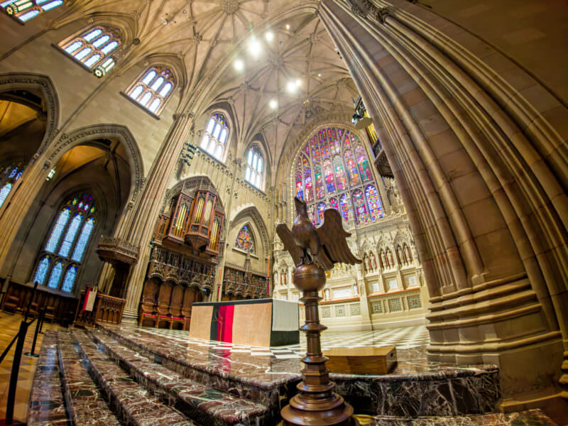 Sample image from the Insta360 Ace Pro 2 of a Gothic cathedral interior with stained glass and eagle lectern