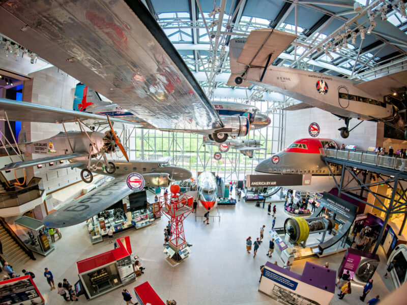 Sample photo from the Insta360 Ace Pro 2 of vintage aircraft suspended inside the Air and Space Museum