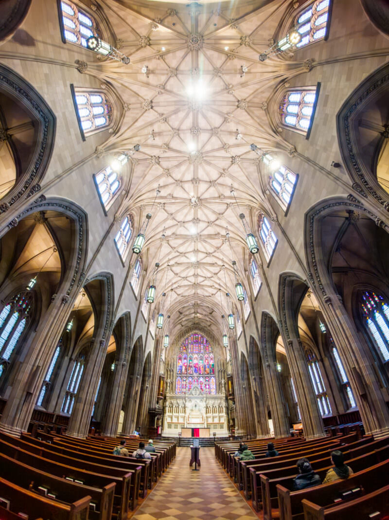 Sample photo from the Insta360 Ace Pro 2 of a Gothic church nave with vaulted ceiling and stained glass