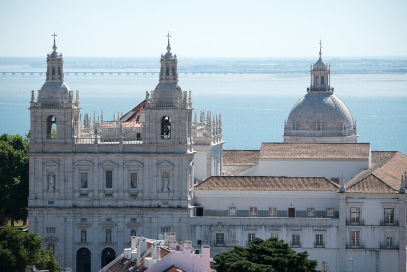 Twin bell towers and dome of the Monastery of São Vicente de Fora seen from Castelo de São Jorge's ramparts