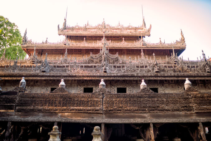 Shwenandaw Monastery Teak Facade Carved Eaves Finials Mandalay Myanmar