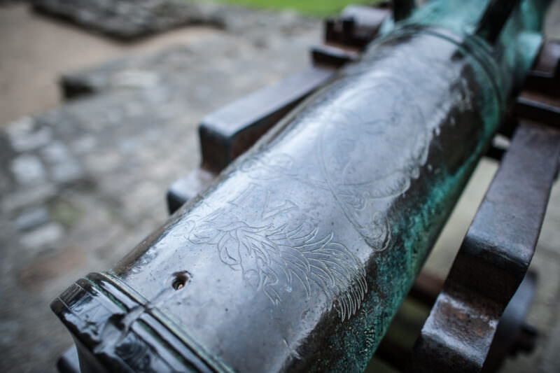 Decorative details on metal cannon at Caernarfon Castle