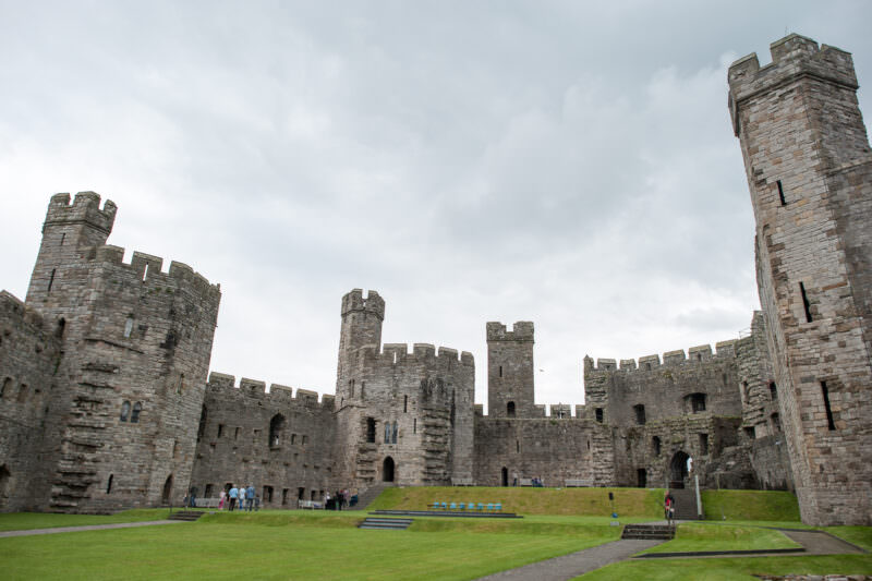 Ramparts looming over interior courtyard at Caernarfon Castle