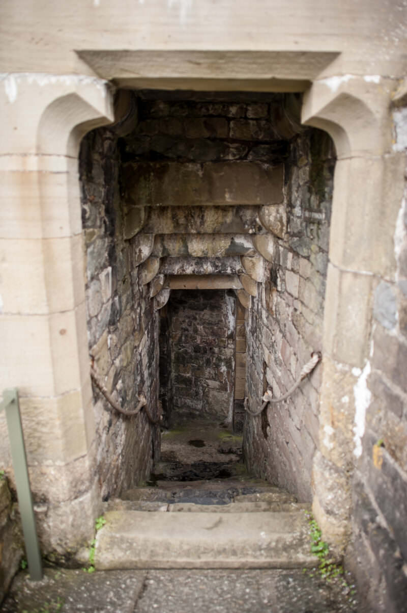 Stone stairway descending within walls of Caernarfon Castle