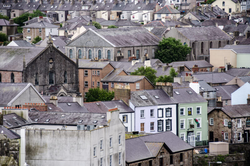 Welsh slate rooftops across Caernarfon town viewed from castle tower