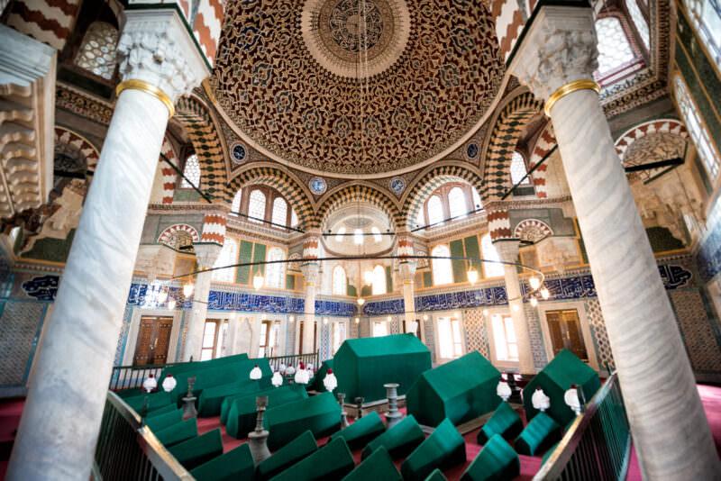 Wide view of the octagonal tiled interior and domed ceiling inside the Tomb of Sultan Selim II