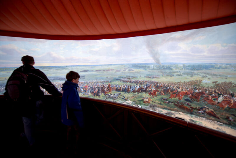 Visitors on central platform inside the Panorama of the Battle of Waterloo viewing the 360-degree painted canvas