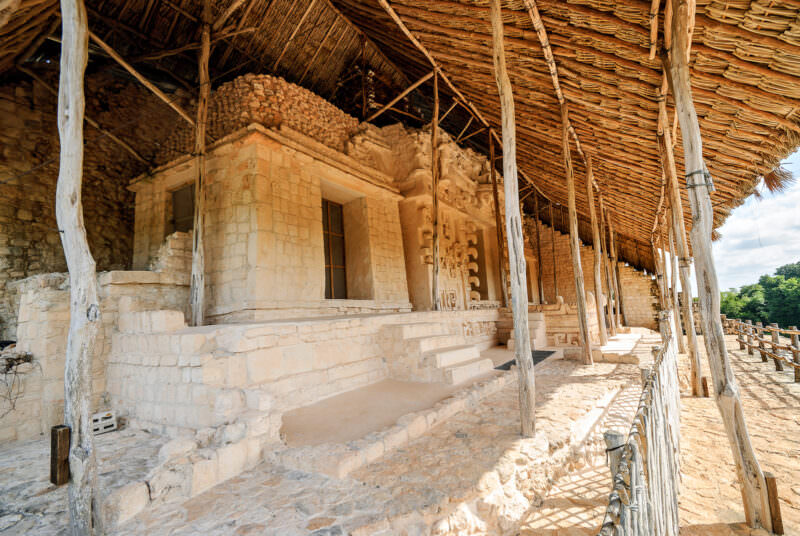 Sak Xok Naah temple sheltered beneath a thatched roof on the fourth level of Ek' Balam's Acropolis