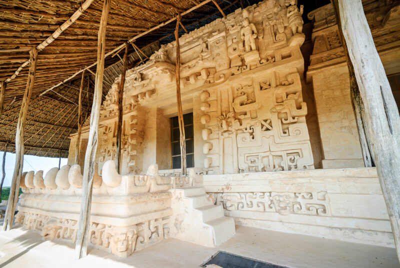 Full stucco program of the Sak Xok Naah at Ek' Balam, with monster-mouth teeth and layered hieroglyphic scrolls