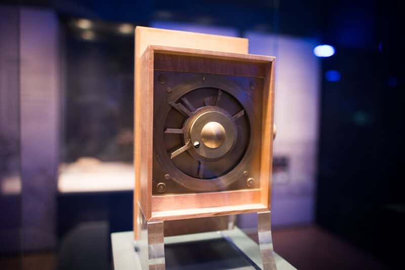 Michael Wright reconstruction model of the Antikythera Mechanism, wooden case with brass spiral dial and pointer mechanism visible