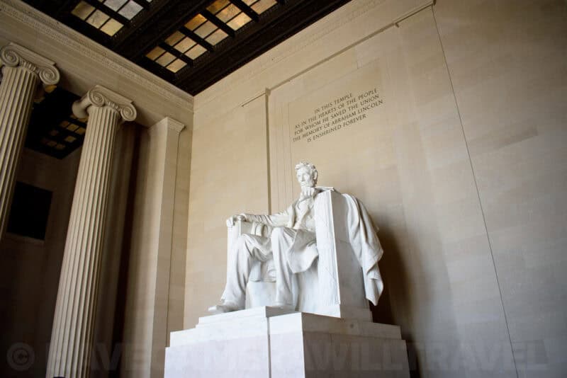 Lincoln Memorial interior showing the seated statue beneath the inscribed Gettysburg Address wall