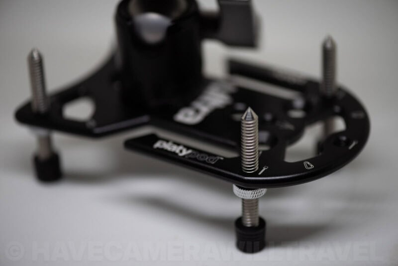 Platypod Ultra plate with spiked feet and ball head attached, propped up for a low-angle shot