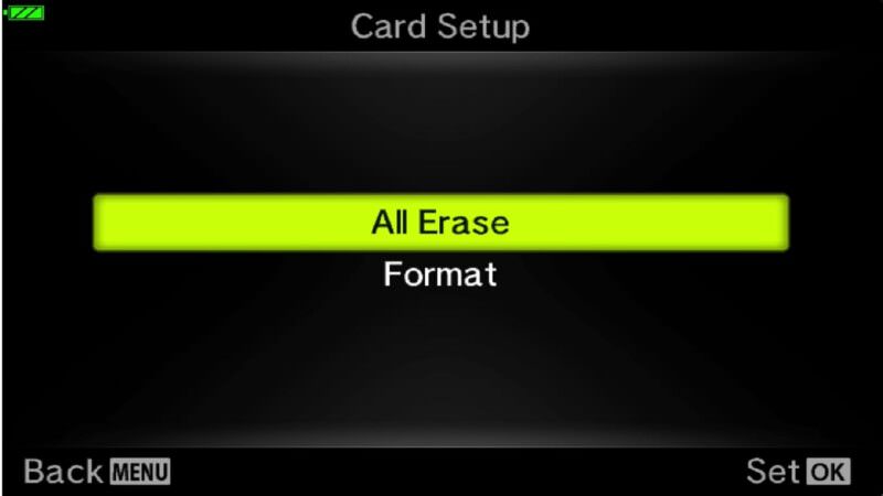 Olympus TG-5 Card Setup screen with All Erase option highlighted above Format