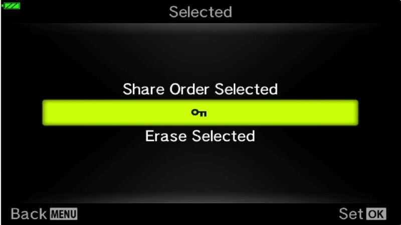 Olympus TG-5 Selected menu showing Share Order Selected, protect key icon, and Erase Selected options