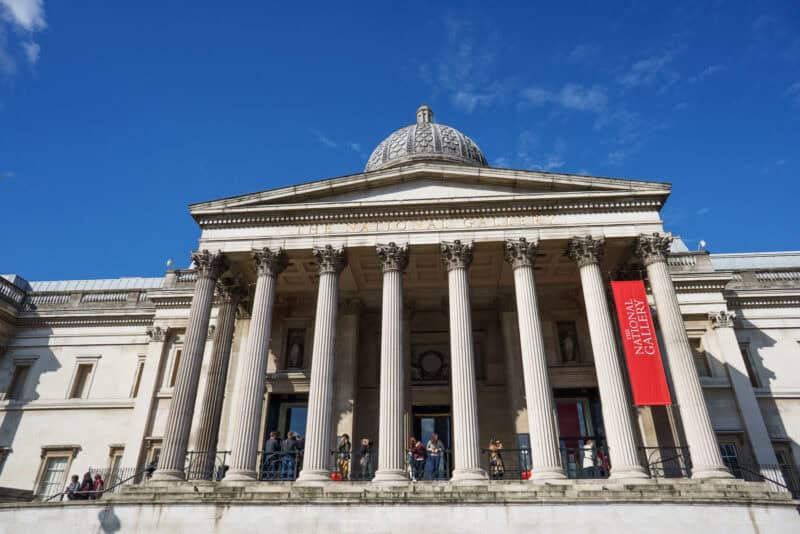 The National Gallery in London, its Corinthian columns and central dome viewed from Trafalgar Square steps