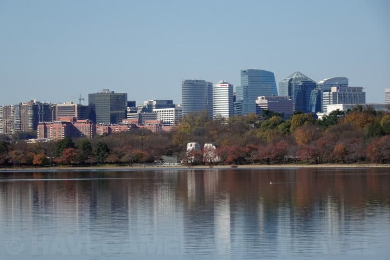 Rosslyn skyline of Arlington reflected in the Potomac River behind autumn trees