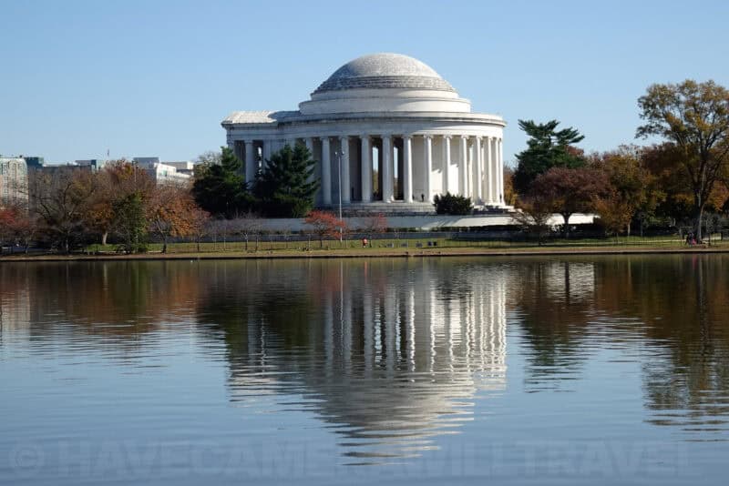 Jefferson Memorial dome and colonnade reflected in the Tidal Basin surrounded by autumn trees