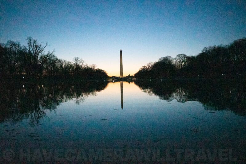 Washington Monument silhouette reflected in the Reflecting Pool at twilight