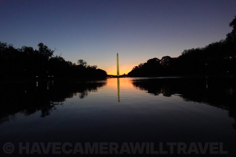 Washington Monument silhouette with rippled reflection in the foreground pool, ISO 2500 sample