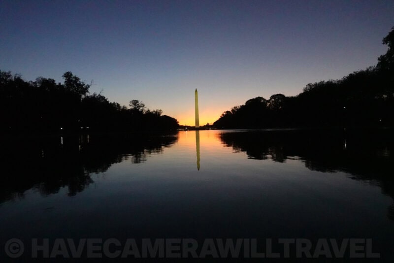Washington Monument reflected in water with noticeable image noise, ISO 5000 sample shot