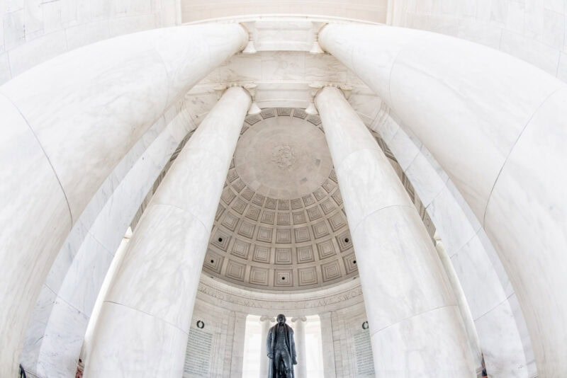 Looking up at the marble columns and coffered dome inside the Jefferson Memorial