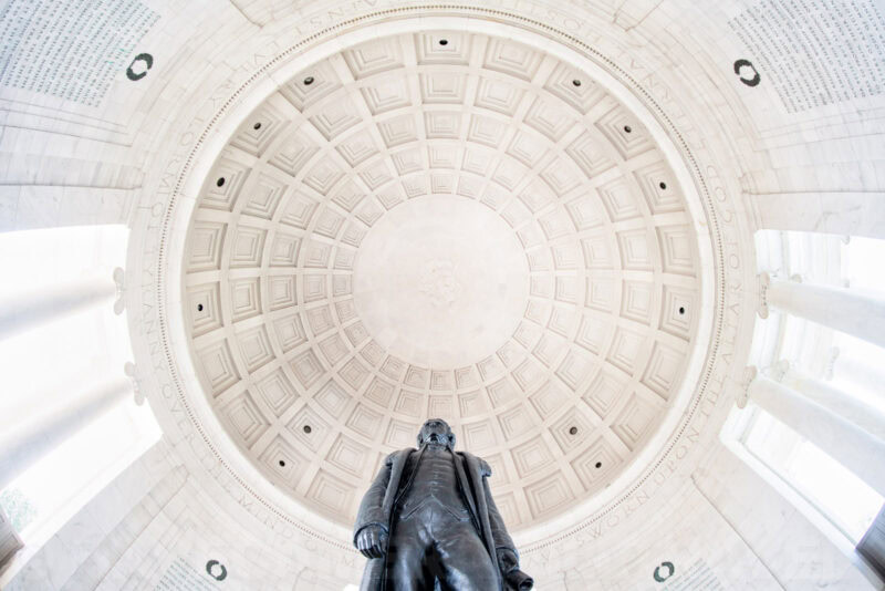 Coffered dome ceiling of the Jefferson Memorial with inscribed text above the statue of Thomas Jefferson