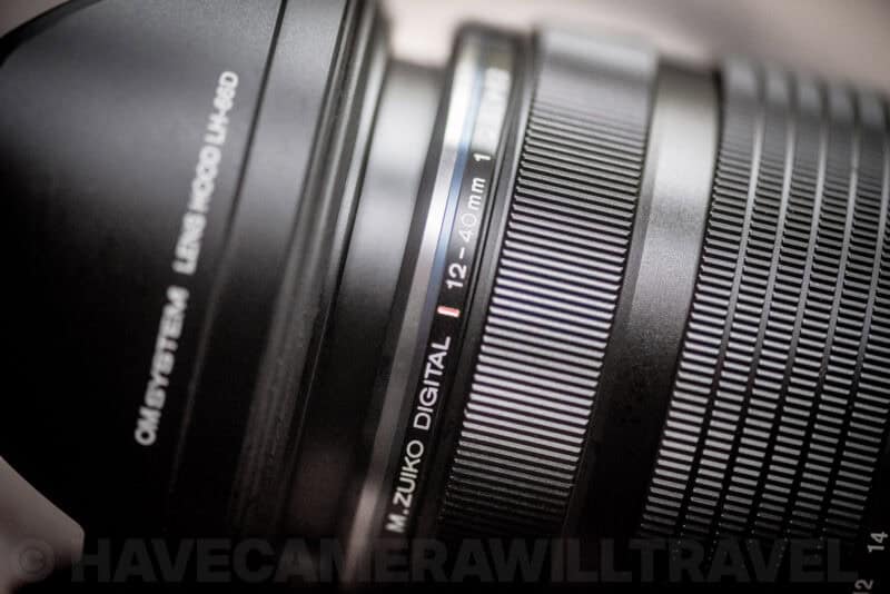 M.Zuiko 12-40mm f/2.8 PRO II lens with focus ring forward in autofocus mode, distance scale hidden