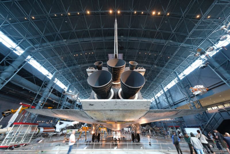 Space shuttle exhaust nozzles and tail fin displayed in an aircraft hangar, ISO 125 test image
