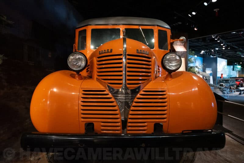 Vintage orange truck grille and headlights captured at ISO 8000 for low-light comparison