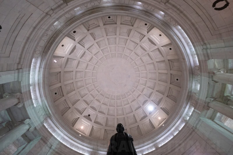 Coffered dome ceiling of the Jefferson Memorial viewed straight up with inscribed frieze