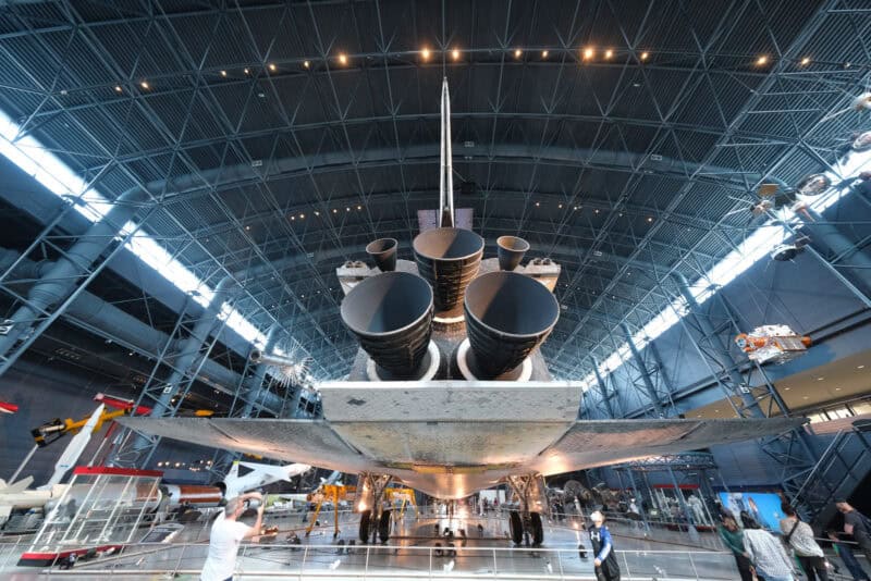 Space shuttle's three main engines and tail fin seen from beneath in the museum hangar, ISO 1600 sample