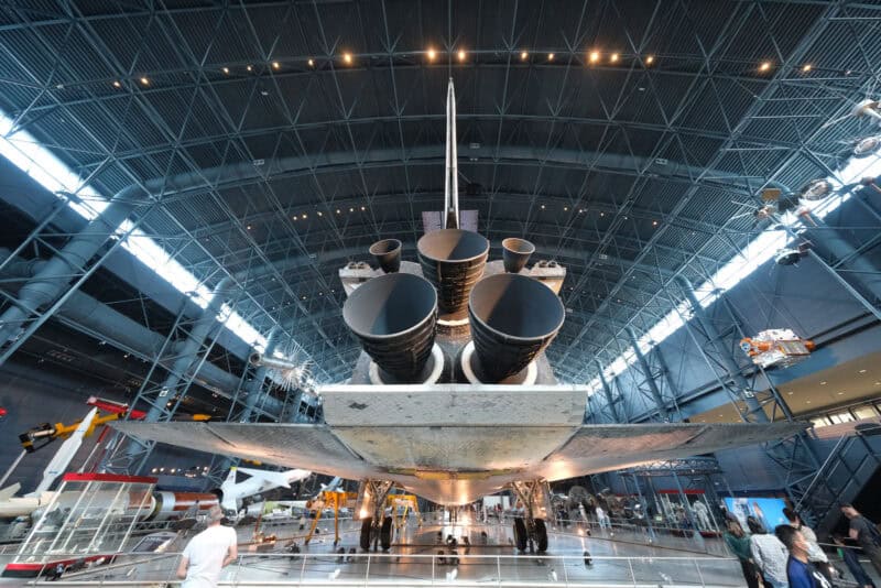 Space shuttle's exhaust nozzles and vertical stabilizer photographed from below, ISO 2500 sample image