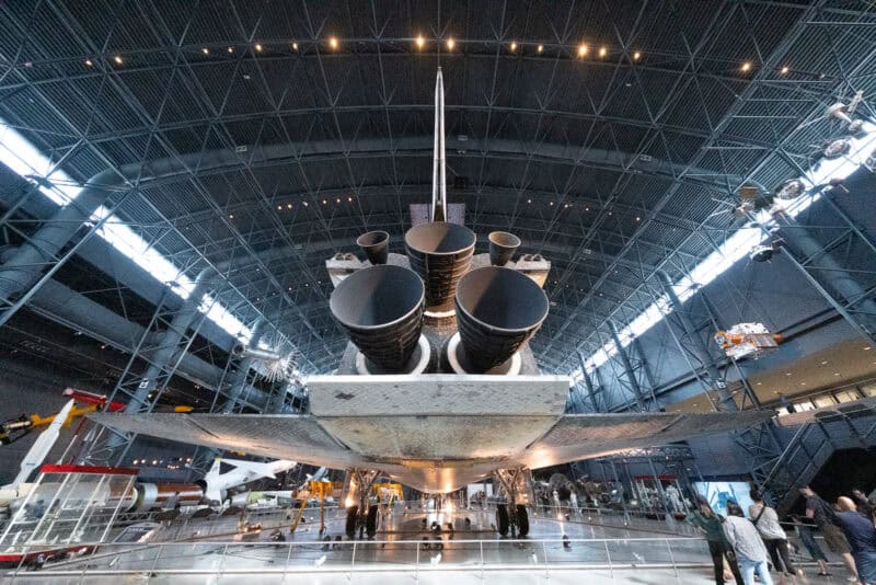 Space Shuttle Discovery's engine nozzles viewed from below inside the Udvar-Hazy Center hangar