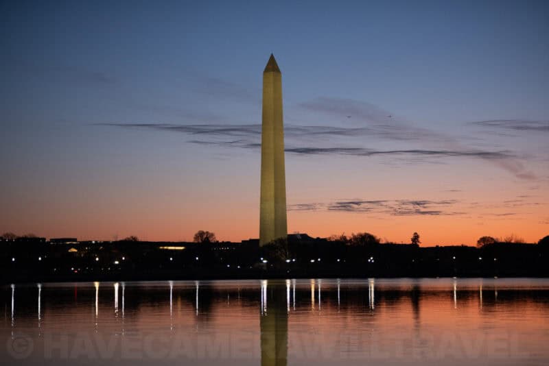 Washington Monument at dusk with two aircraft visible in the sky, Fujifilm X-T5 ISO 640 test image