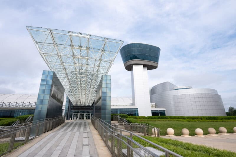 Glass-canopied entrance and control tower of the Udvar-Hazy Air and Space Museum annex exterior