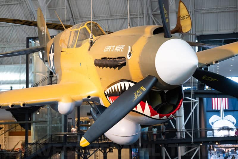 Nose art and shark-mouth propeller of the Curtiss P-40 'Lope's Hope' fighter plane on museum display