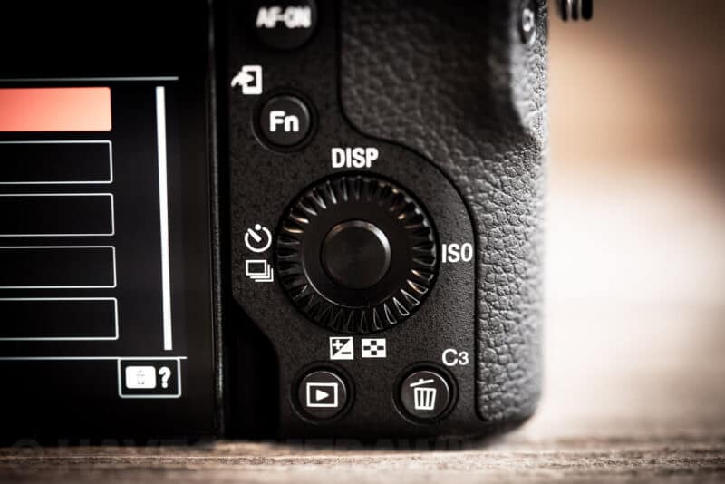 Close-up of the Sony a6700's rear control dial between the Fn button and ISO marking