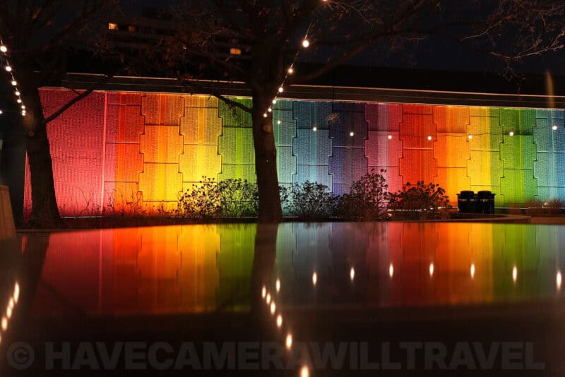 Colorful illuminated wall and its reflection in a pool at night, ISO 4000 test image