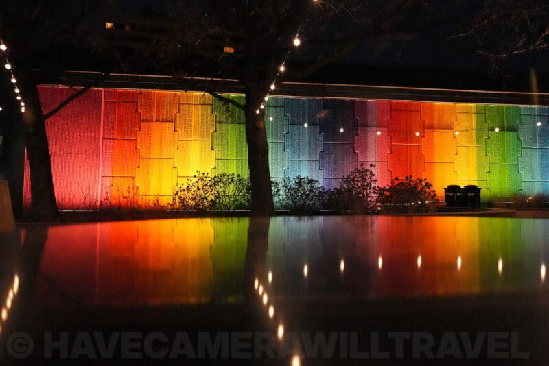 Night shot of rainbow wall and reflection with visible noise at ISO 25600