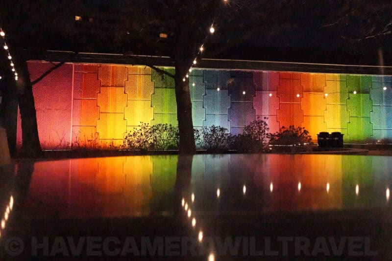 Rainbow wall lighting reflected in water showing heavy grain at ISO 80000