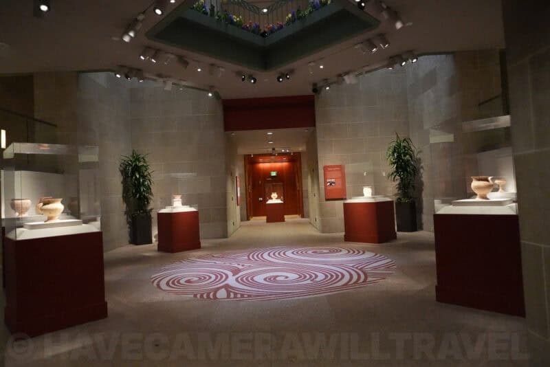 Interior museum gallery with vases displayed and spiral carpet design, ISO 8000 test shot