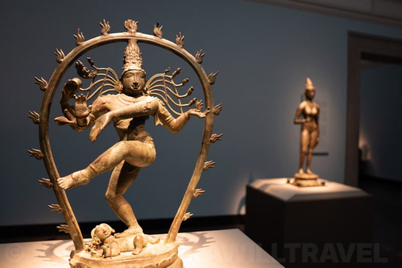 Bronze Nataraja statue of dancing Shiva displayed in a museum gallery